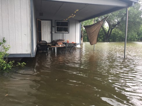 Mind you, the trailer is jacked up about waist-high above the ground Photo of my trailer house the day after Hurricane Harvey. Water is almost to the floor of the trailer, which is 3-4 feet above the ground